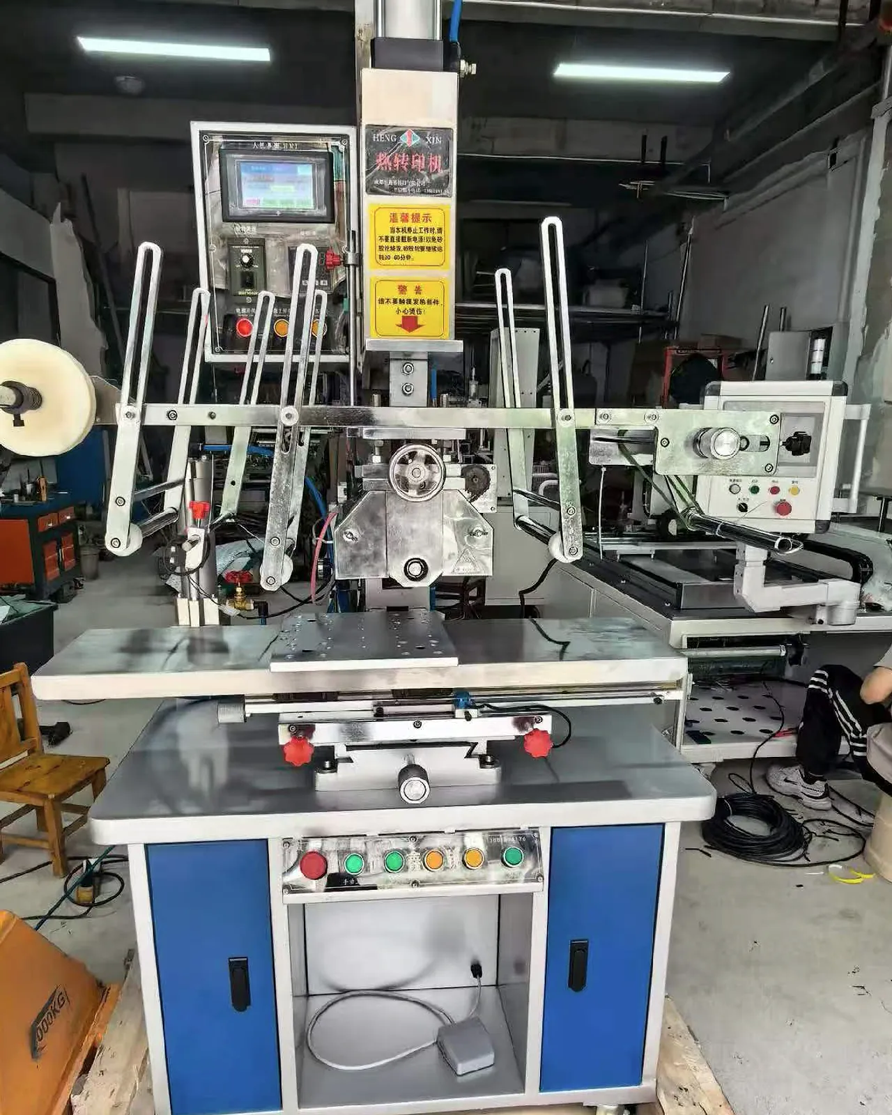 Semi-automatic hot stamping machine during pre-shipment inspection