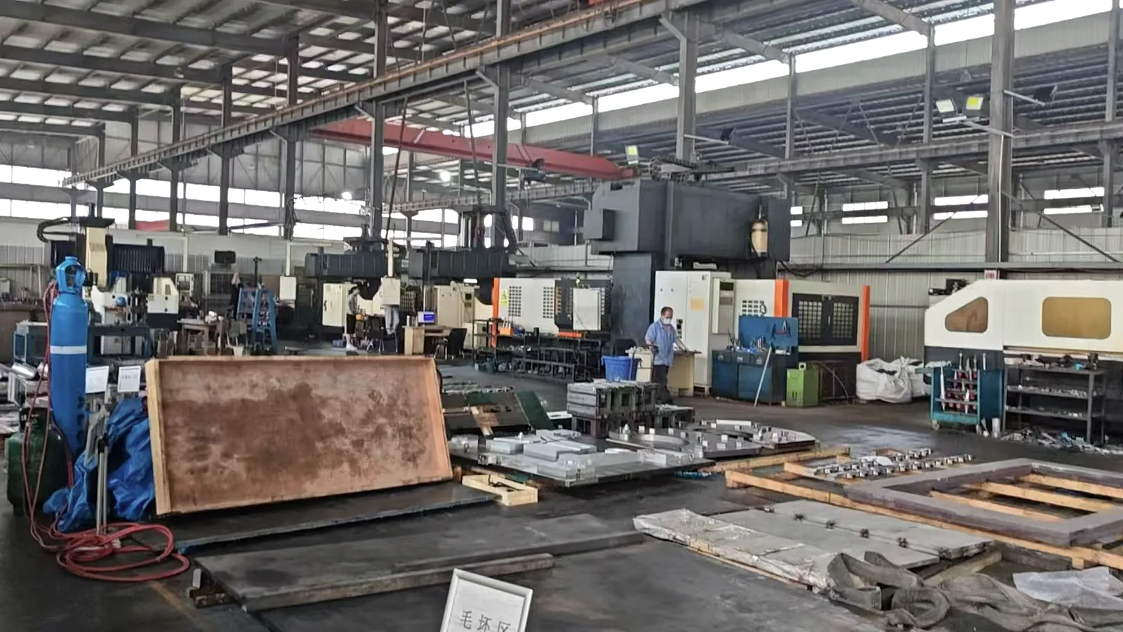 Partner manufacturing workshop with industrial fabrication equipment